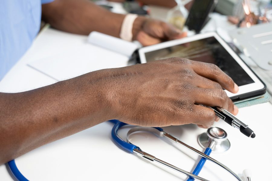 Physician managing a patient's chronic care remotely