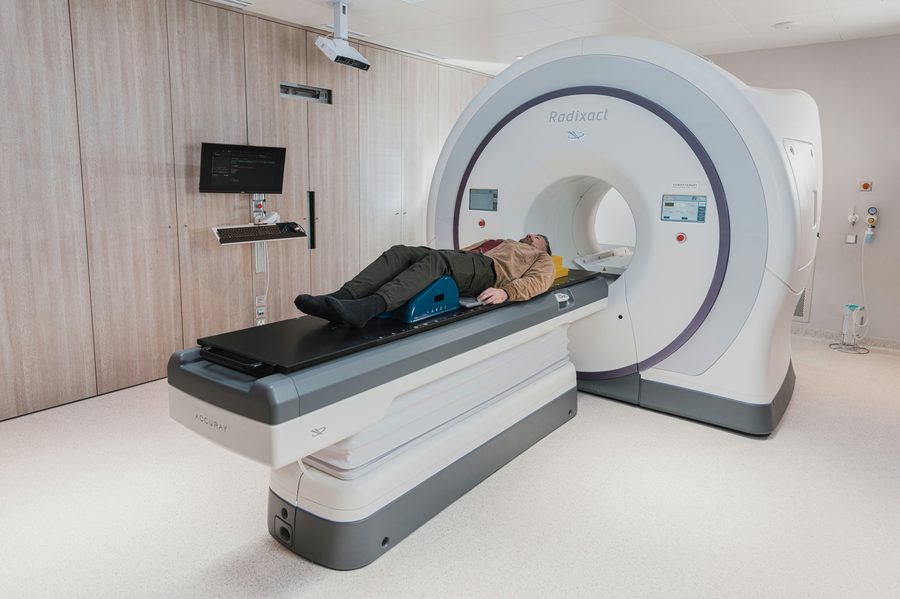 Patient undergoing a scan in an imaging center